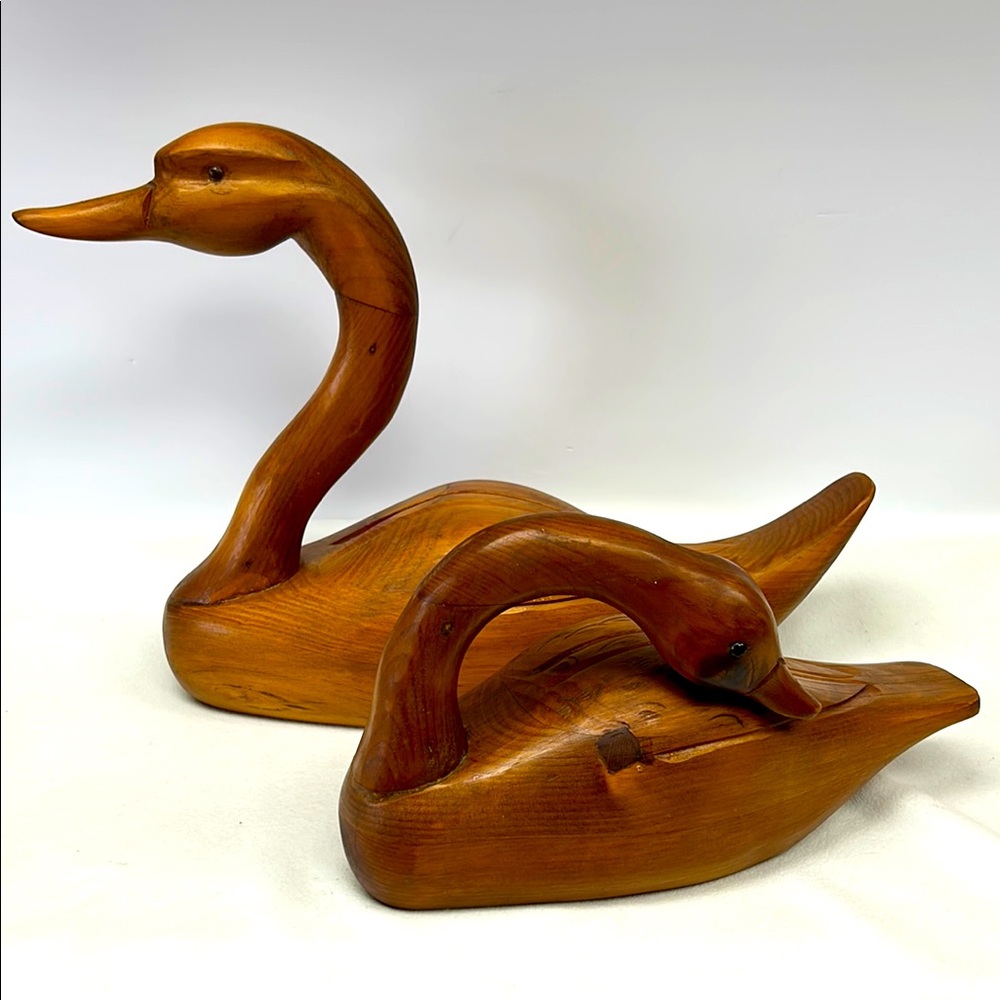 Vintage 1990 pair of artist signed Rob Young hand carved wooden Trumpet Swans